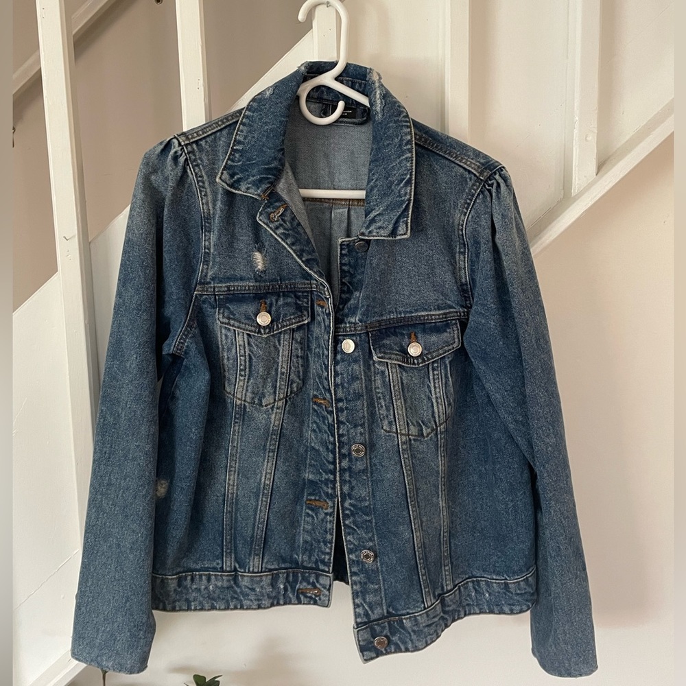 Distressed denim jacket